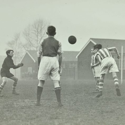 Hackney Marsh Playing Fields, 1947. (Collage 280528) Black and white photo of boys playing football | Image courtesy of London Metropolitan Archives