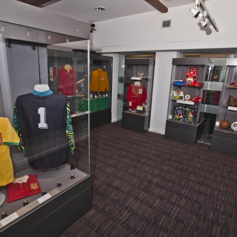 Wrexham Museum pics Cabinets displaying Welsh Football memorabilia | Image courtesy of the Welsh Football Collection