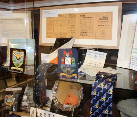 The Story of the U's – cabinet interior Various items in a display cabinet at The Story of the U's museum | The Story of the U's