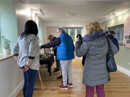 People look at an exhibition