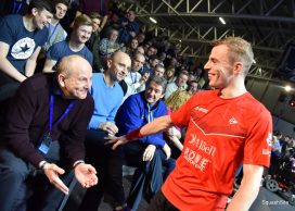 Squash player, Nick Matthew greeting his father, Hedley in front row of watching crowd.