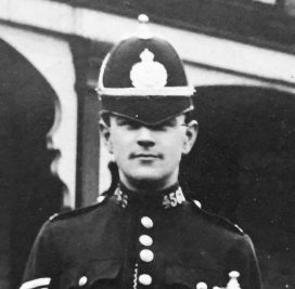 Black and white image of police officer