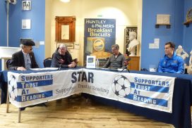 Men take part in a panel discussion