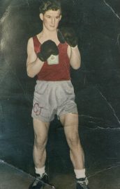 Young man posing in boxing gloves and gym kit. Halifax Star Amateur Boxing Club.