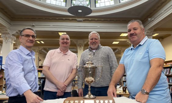 Display of Historic Football Trophy Scores with Local Community